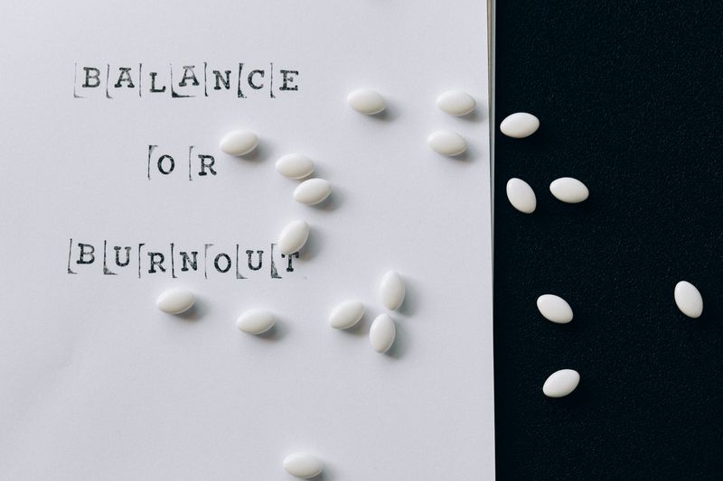 small white medication on a black and white background
