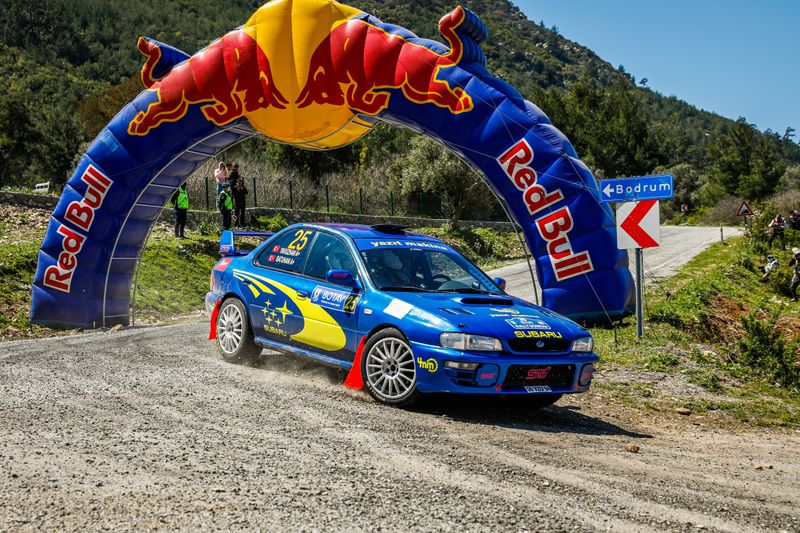 car near an inflatable arch